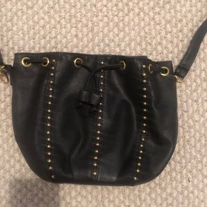 Black faux leather handbag